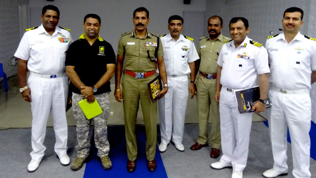 Debriefing Safety Drill Data from Tsunami Simulation at INS Adyar: Commodore Amar K Mahadevan NOIC Ind Standing Left to Right.